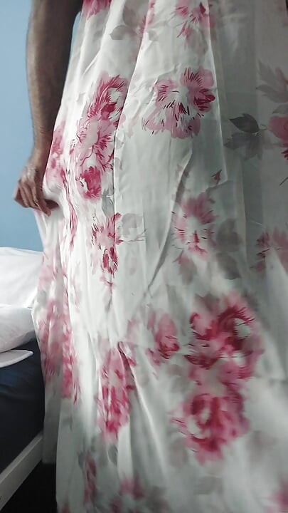 I'm masterbating in a flowery flowing silky seethrough fleard skirt and cum