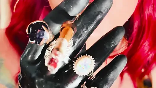 The Beautiful Rubber Beauty Tina Snua Smoking A Cigarette Using A Holder - Smoker Latex Gloves Rings Jewellery