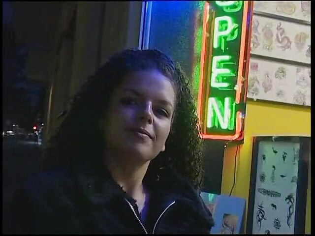 Fabulous brunette with curly hair wants a new tattoo