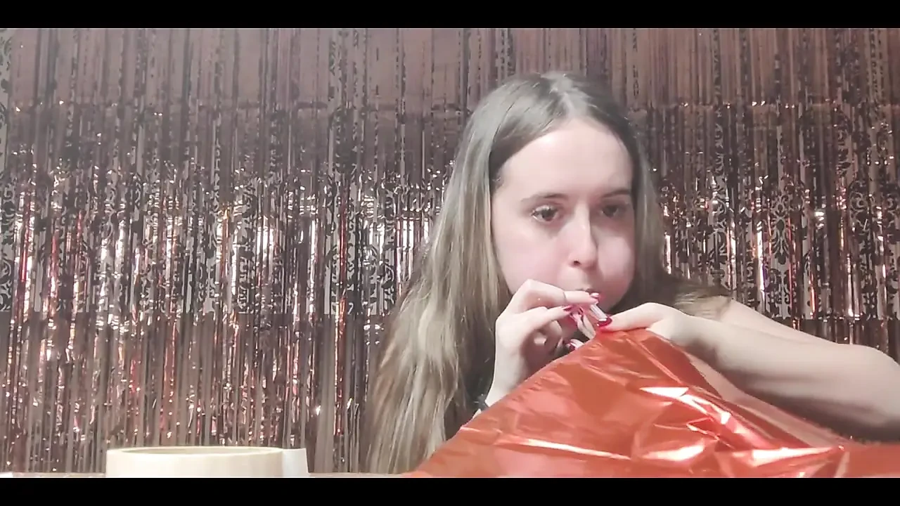 Getting Ready for Valentine’s Day by Inflating Balloons