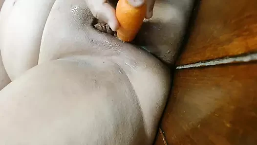 Carrot masturbating pussy leads to creamy mess and orgasm