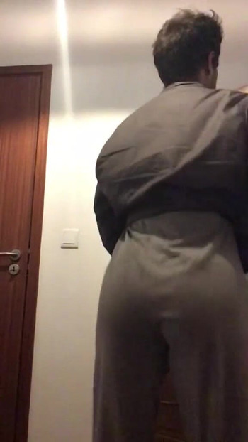 Sissy faggot in thong showing her ass