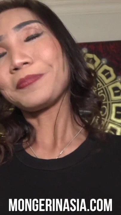 Captivating moment from "Stunning Asian MILF Wants Baby Number Two"