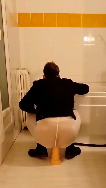 Dildo Riding in the Bathroom Wearing an Open White Pantyhose