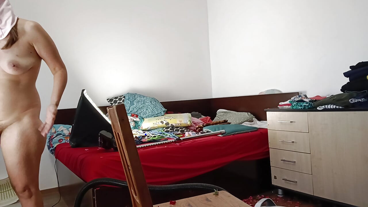 Amateur wife vacuuming in the bedroom. Amateur wife gives me a handjob until I cum.