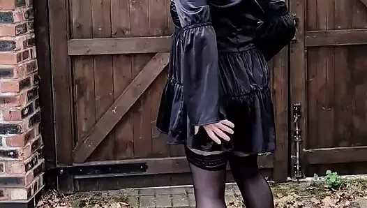 Hot crossdresser in sexy black satin and stockings