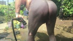 Naked gardening. Watering, muddy play and cold shower