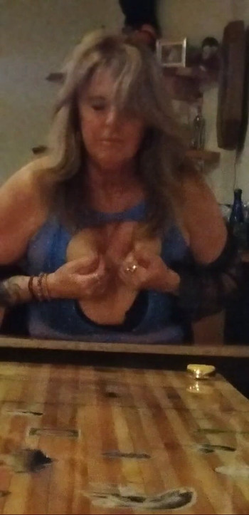 Topless at the bar