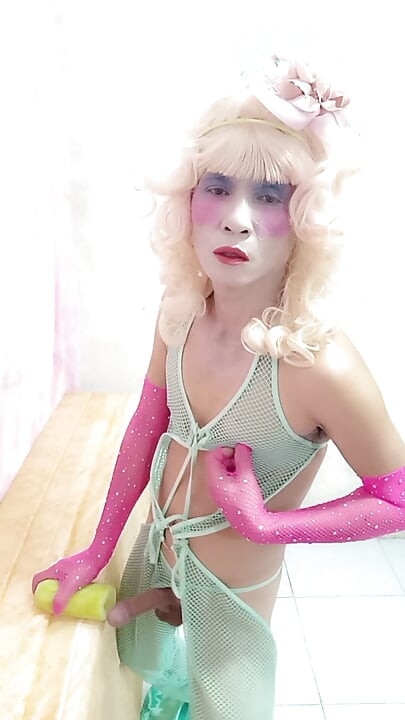 Oanh Le transgender wearing sexy clothes porn playing with an artificial can