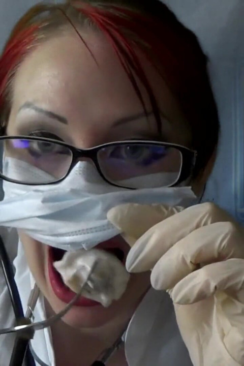 Doctor eating in medical mask and gloves