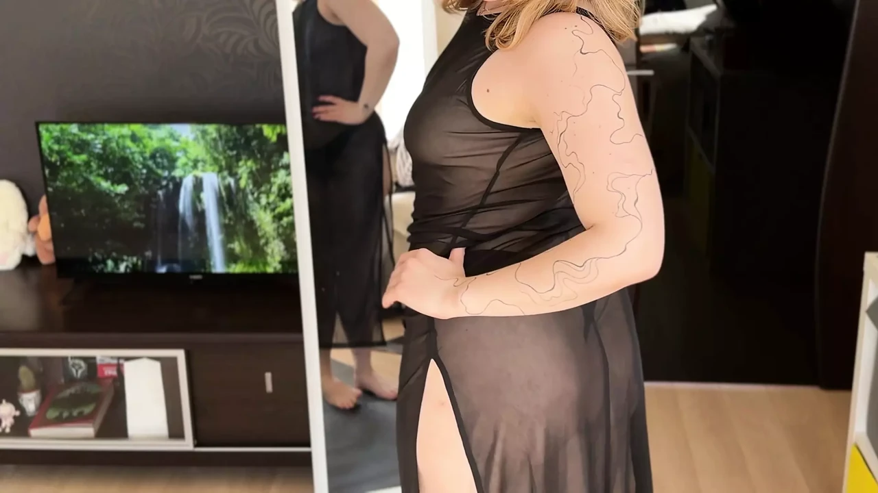 Hot blonde in black see-through dress