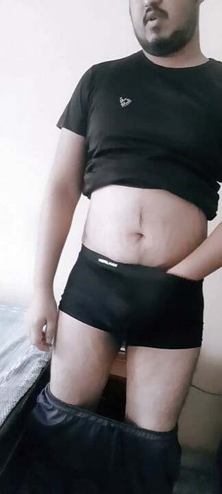 The cock is standing in the underwear.
