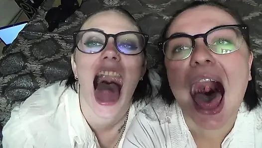 Two business women taunt you with their mouths & tongues before eating you whole!