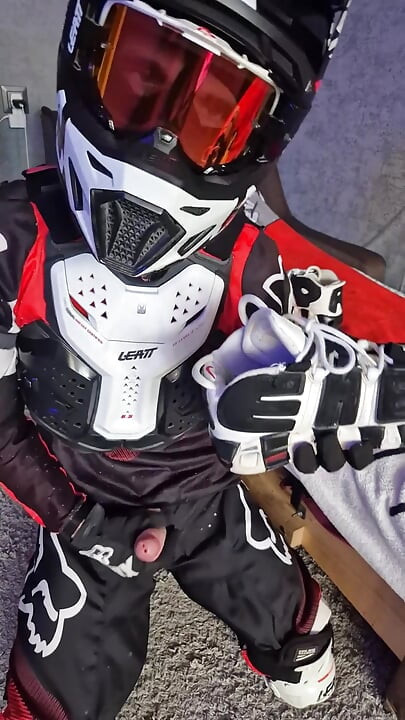An Excited Guy in Motorcycle Gear Fucks His Sneakers
