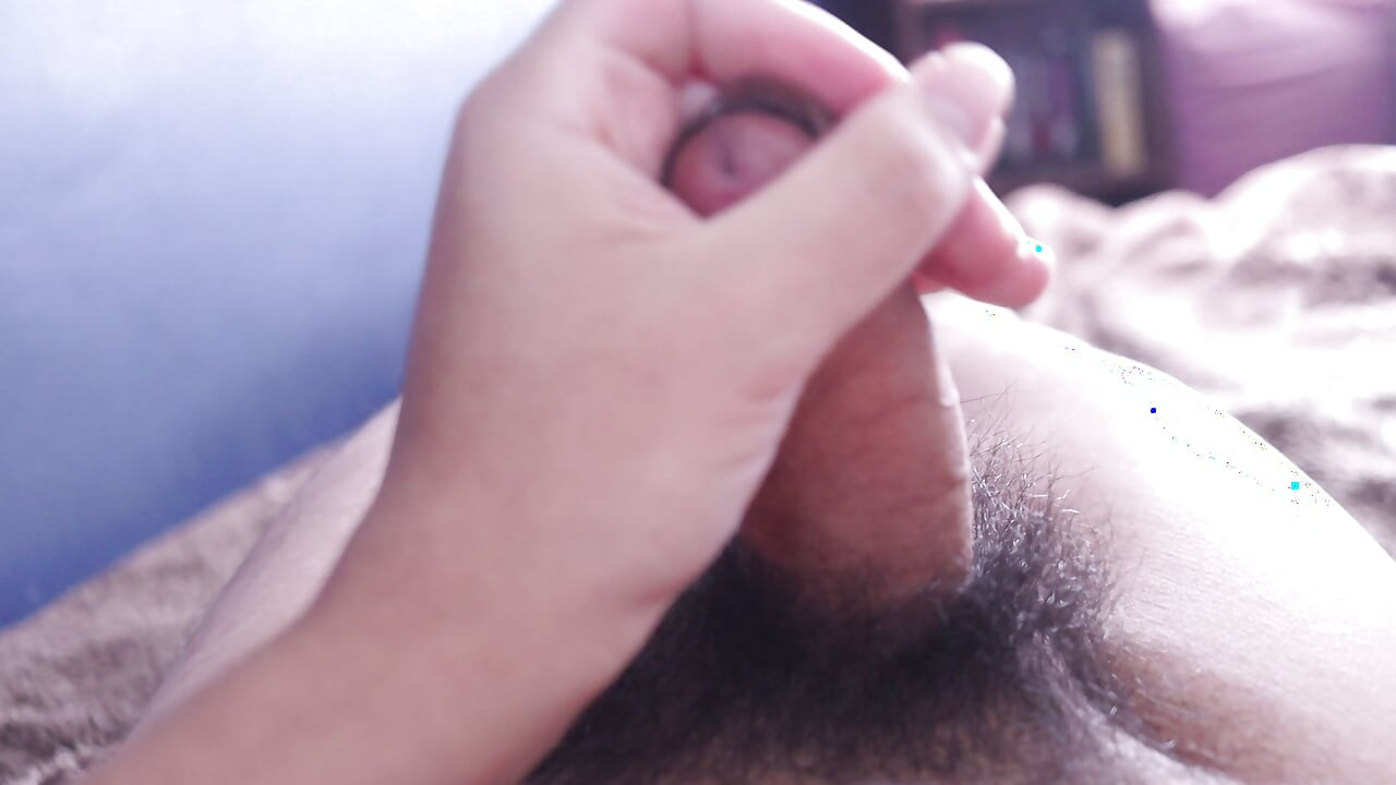 jerking off and cumming in bed