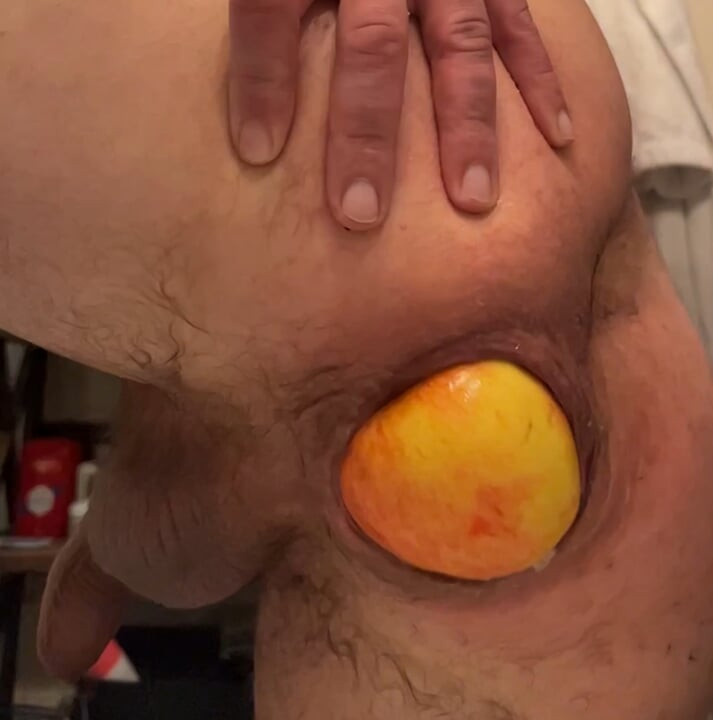 Guy pushes out big apple out of his loose ass