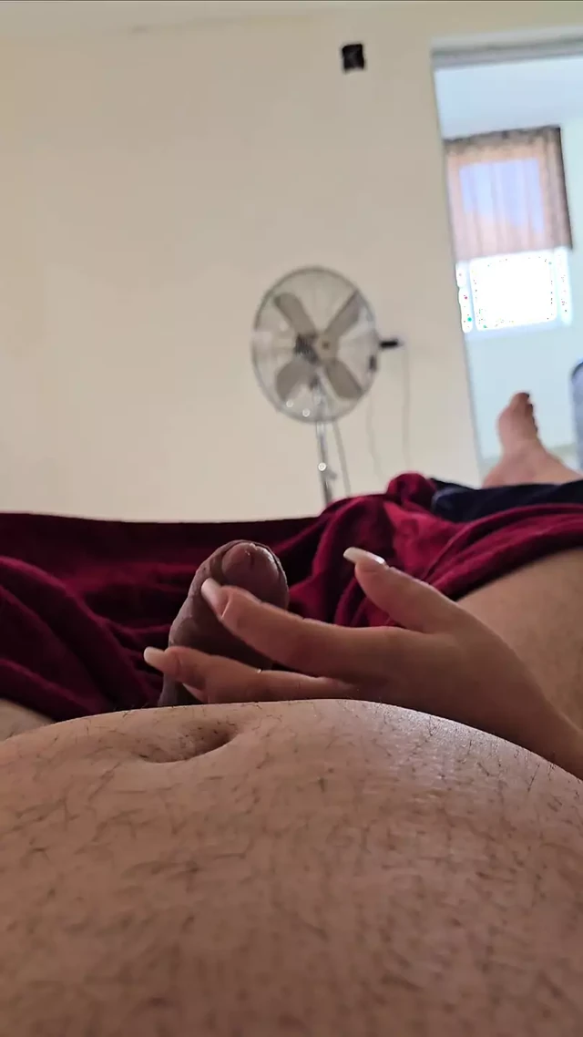 Step mom lying on the bed handjob step son dick without shame