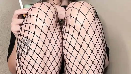 Smoking in Fishnets, Teasing You with a Peek of My Pussy