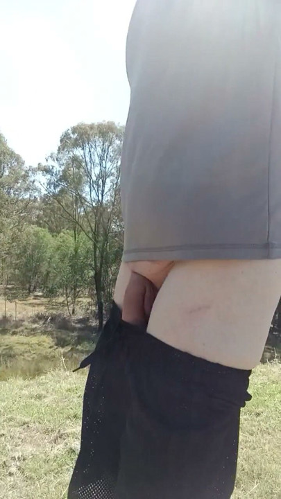 Big cock outdoors - fully exposed on a hike.. taking see through shorts off | Clip 1