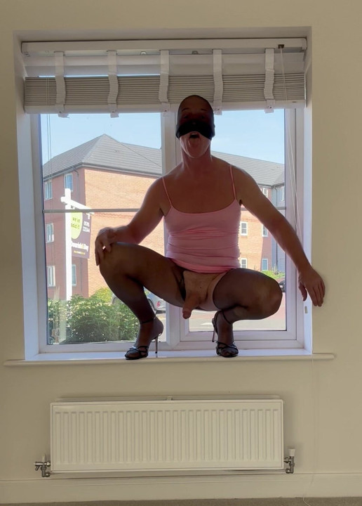 Slut fag sissy wanking in the window