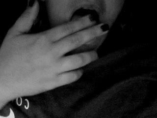 Cleaning her own pussy juice off her fingers