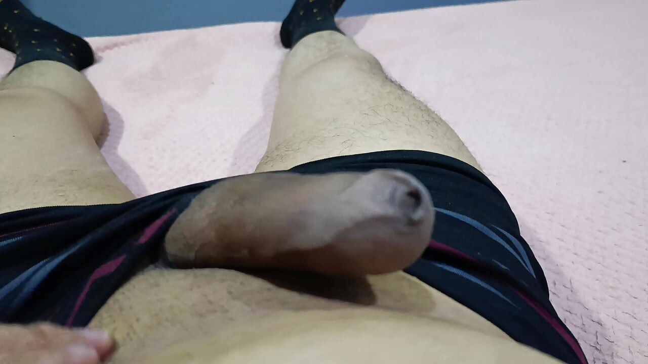 I massage my big cock on the hotel bed at night to really relax.