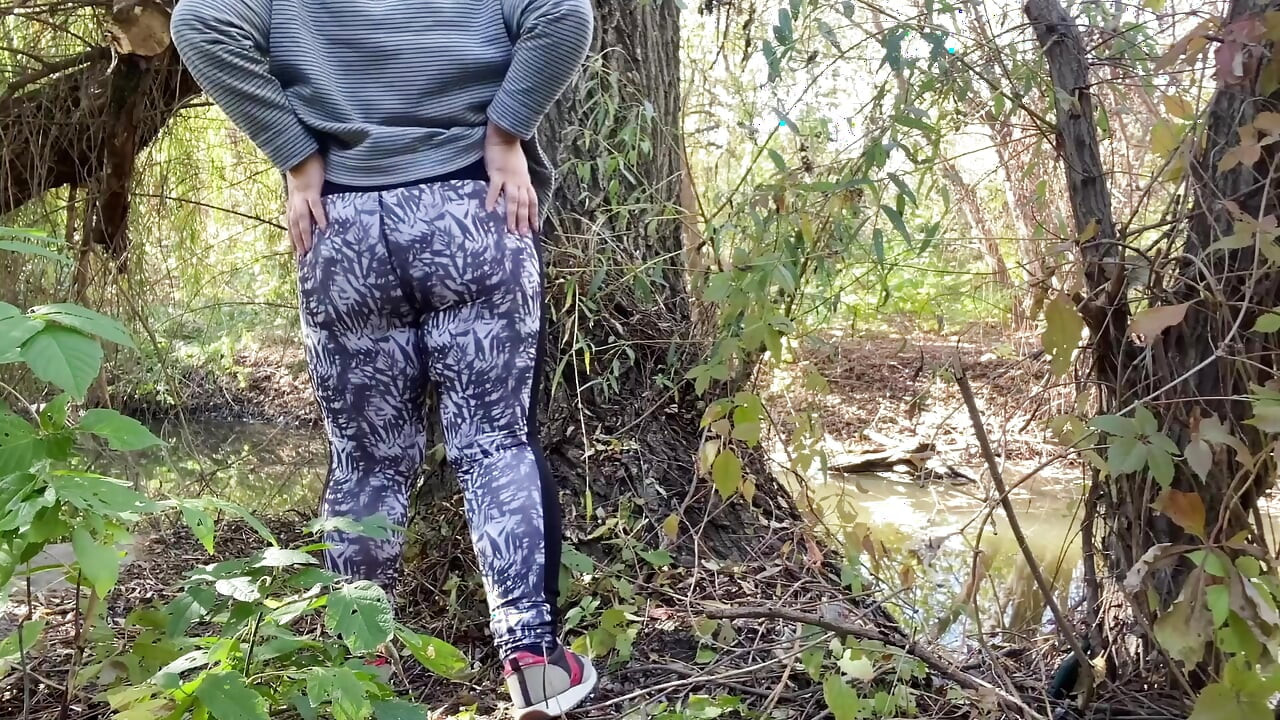 Mature, curvy milf stepmom fingers herself outdoors