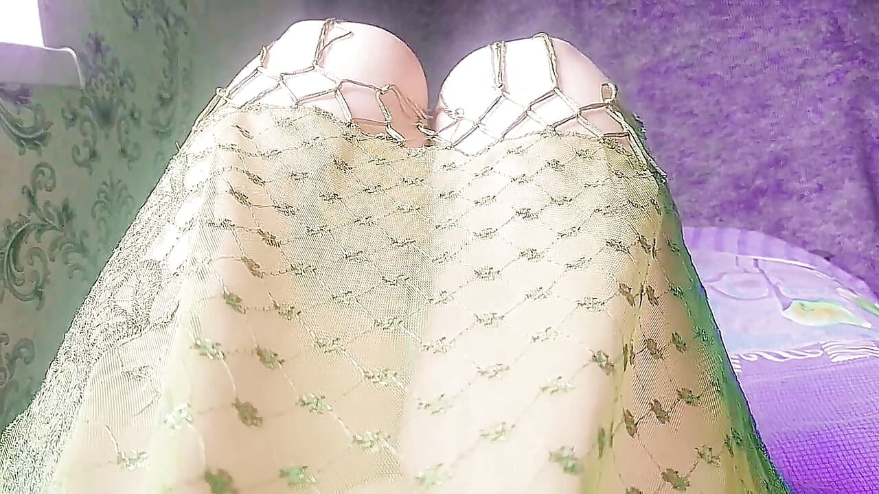 Cute femboy pulling oversized sweater over bare legs
