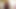 大きな胸を持つ黒檀の女性が自分のアソコで遊ぶのを楽しんでいる