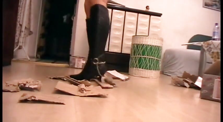 Crushing box with high heeled boots