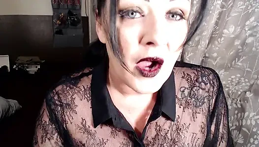 Milf putting on dark red lipstick