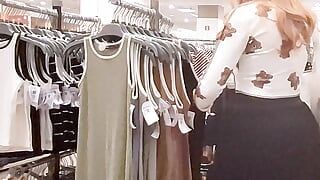 Girl goes shopping and masturbates in the fitting room