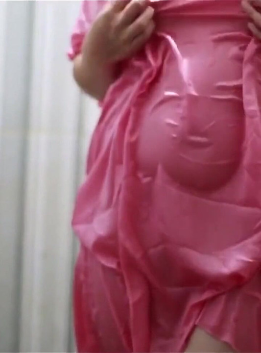 Indonesian Porn Peeping at a Busty Girl Taking a Bath in a Transparent Satin Dress