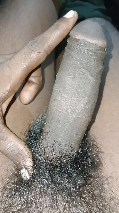 The village boy is having fun in the field with a big cock the darkest cook in Indian.