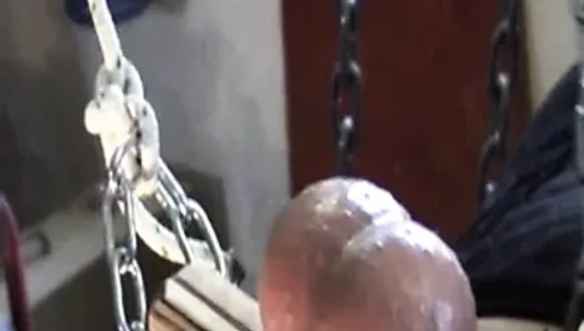 extreme session BDSM: ball suspended and 3 needle in