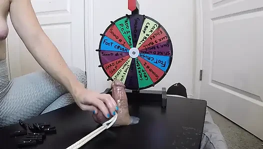 She inserts a 30cm probe all the way into his meaty cock. Playing BDSM roulette.