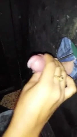 She finishes him with a handjob in the glory hole