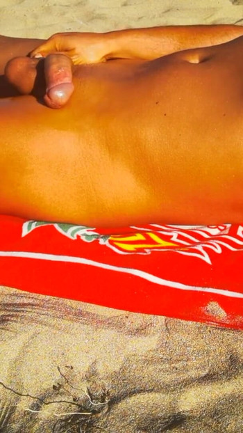 Powerful moment from "Desperately Want To Cum After A Whole Day Watching Teens On The Nude Beach"