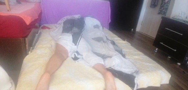 Sensual massage of a hot couple with oil on the body.