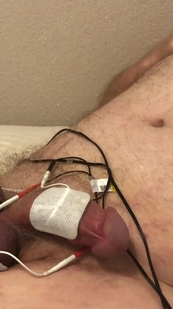 Must-see moment from "A stiff dick, estim pulse and some ballbusting edging ends with a hands free orgasm."