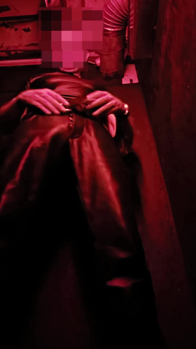 I show you my leather bulge in the corner of the darkroom, and then pull out my hard cock for you.