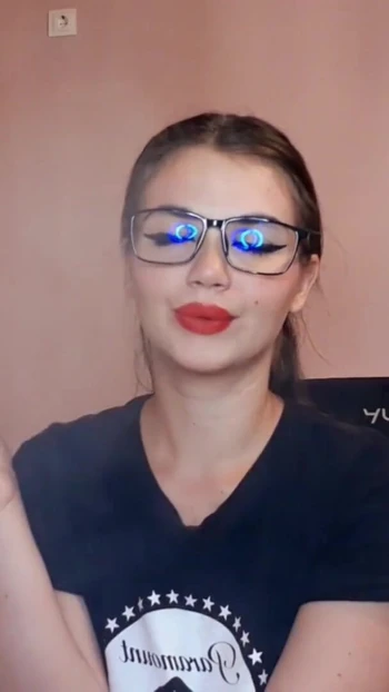 Emotional moment from "Sensual brunette smoking and wearing geek glasses"