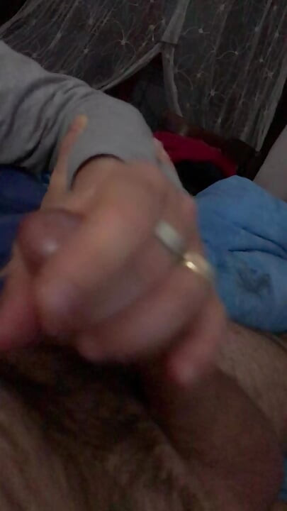 My wife gives me a gorgeous night handjob with a copious cum blast