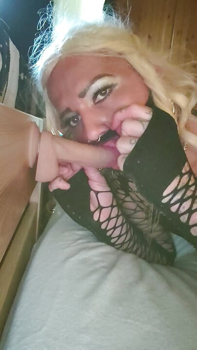 Blonde Sissy Crossdresser sucking dildo