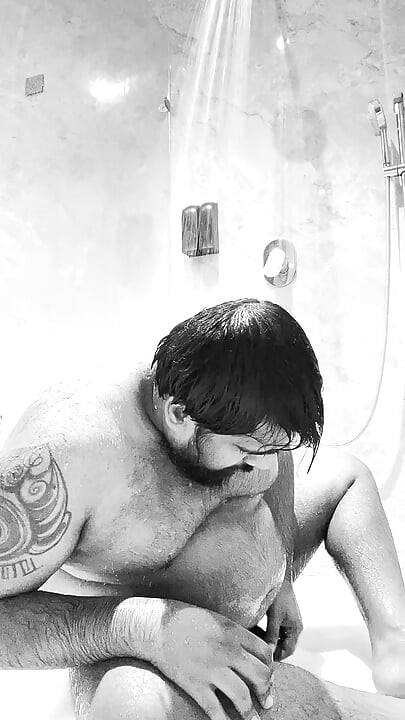 Young bear masturbates while showering