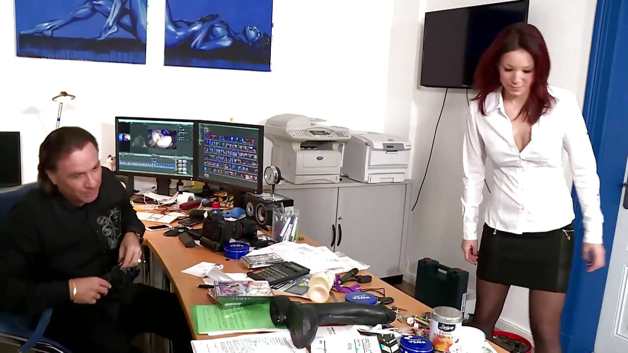 Redhead girl enjoys big cock with the boss in the office