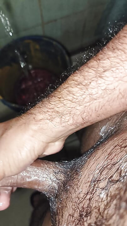Hairy skinny man masturbates in pope's shower while not at home