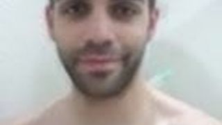 Spaniard man taking a shower