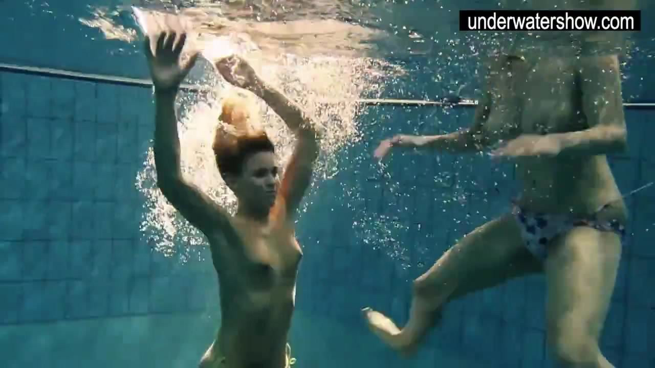 Two sexy amateurs showing their bodies off under water