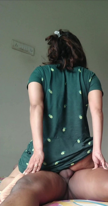 Captivating moment from "GREEN TOP DESI GIRLFRIEND RIDE BOYFRIEND CUM ON ASS"